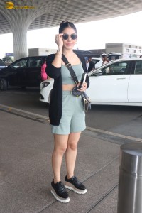 actress Alaya F in a green dress at mumbai airport