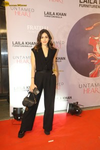 actress Alaya F in a black dress on red carpet