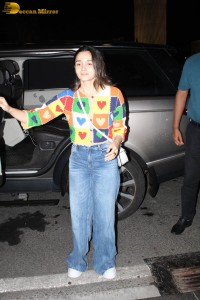 alia bhatt in a colorful sweater at airport
