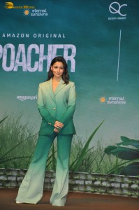 actress Alia Bhatt pretty in a green suit at an event