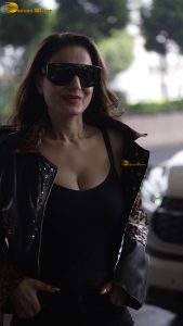 actress Ameesha Patel red-hot sexy looks in a black top