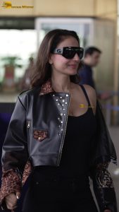actress Ameesha Patel red-hot sexy looks in a black top