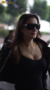 actress Ameesha Patel red-hot sexy looks in a black top