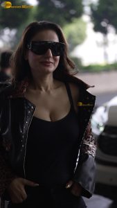actress Ameesha Patel red-hot sexy looks in a black top