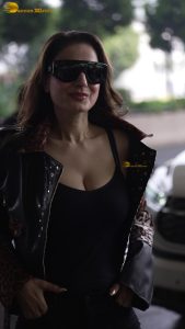 actress Ameesha Patel red-hot sexy looks in a black top