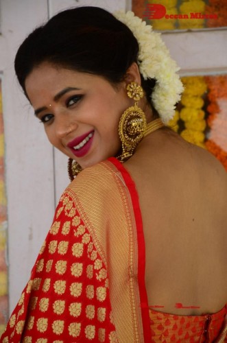 Telugu Heroine Amrita Halder posing in a Red Saree