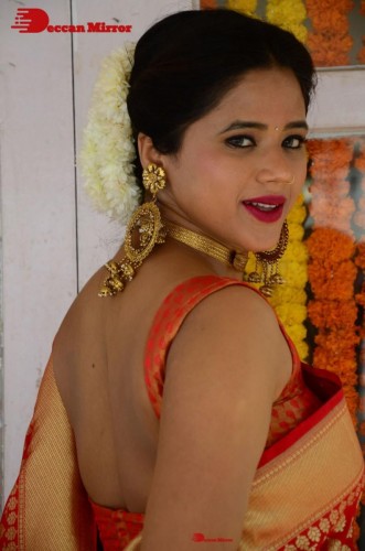 Telugu Heroine Amrita Halder posing in a Red Saree