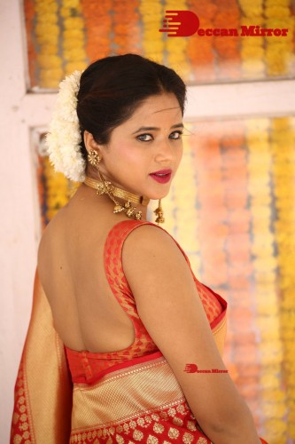 Telugu Heroine Amrita Halder posing in a Red Saree