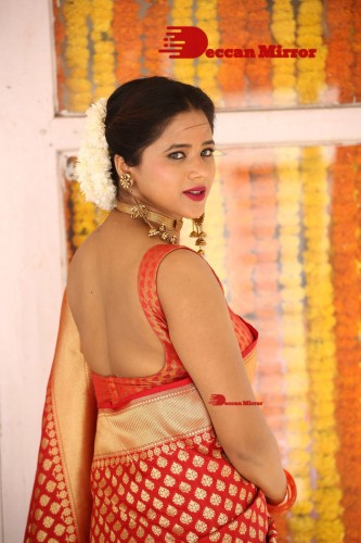 Telugu Heroine Amrita Halder posing in a Red Saree