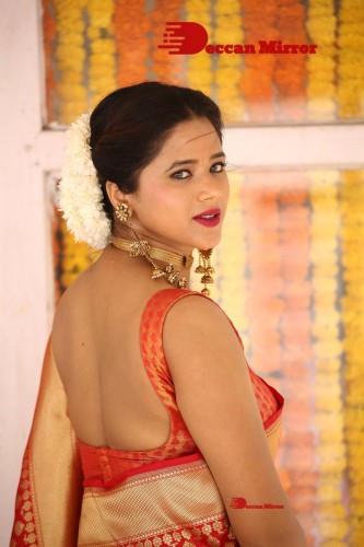 Telugu Heroine Amrita Halder posing in a Red Saree