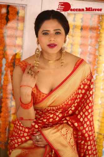 Telugu Heroine Amrita Halder posing in a Red Saree