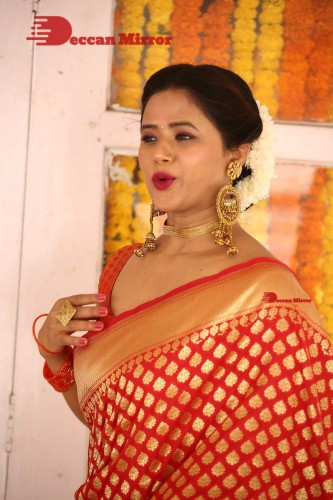 Telugu Heroine Amrita Halder posing in a Red Saree