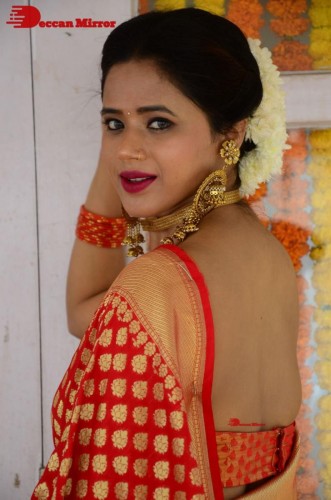 Telugu Heroine Amrita Halder posing in a Red Saree
