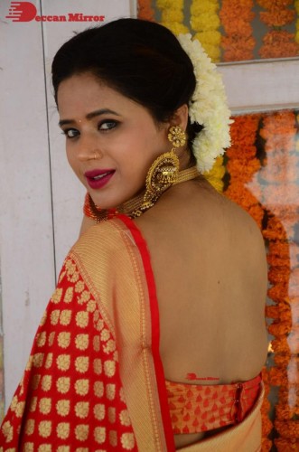 Telugu Heroine Amrita Halder posing in a Red Saree