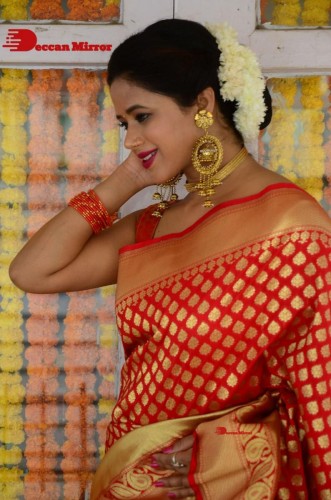 Telugu Heroine Amrita Halder posing in a Red Saree