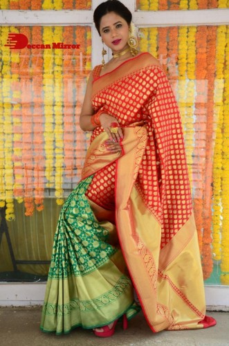 Telugu Heroine Amrita Halder posing in a Red Saree