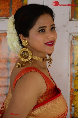 Telugu Heroine Amrita Halder posing in a Red Saree