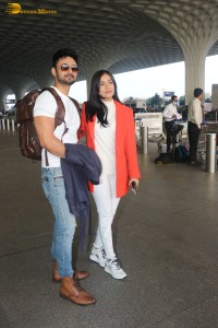 Actress amrita rao spotted with her husband rj anmol at mumbai airport