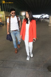 Actress amrita rao spotted with her husband rj anmol at mumbai airport