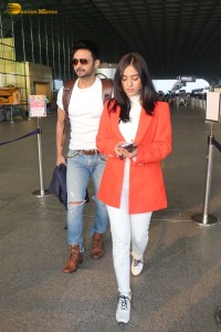 Actress amrita rao spotted with her husband rj anmol at mumbai airport