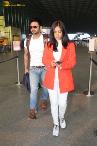 Actress amrita rao spotted with her husband rj anmol at mumbai airport