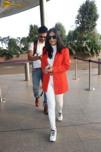 Actress amrita rao spotted with her husband rj anmol at mumbai airport