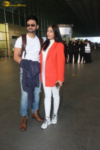 Actress amrita rao spotted with her husband rj anmol at mumbai airport