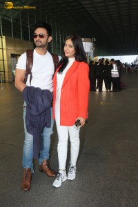 Actress amrita rao spotted with her husband rj anmol at mumbai airport