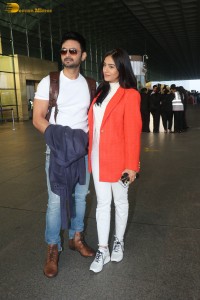 Actress amrita rao spotted with her husband rj anmol at mumbai airport