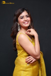 Actress Amritha Aiyer beautiful in a golden yellow saree