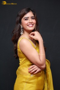 Actress Amritha Aiyer beautiful in a golden yellow saree