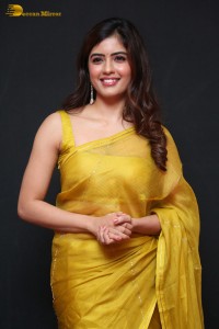 Actress Amritha Aiyer beautiful in a golden yellow saree