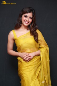Actress Amritha Aiyer beautiful in a golden yellow saree
