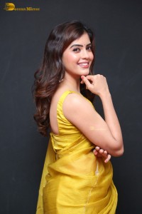 Actress Amritha Aiyer beautiful in a golden yellow saree