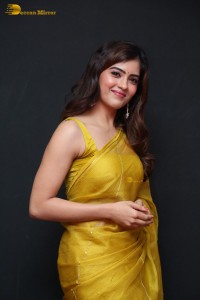 Actress Amritha Aiyer beautiful in a golden yellow saree