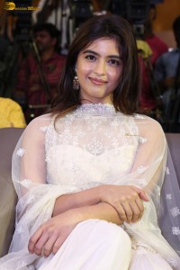 actress Amritha Aiyer dazzles in a white dress at a movie function