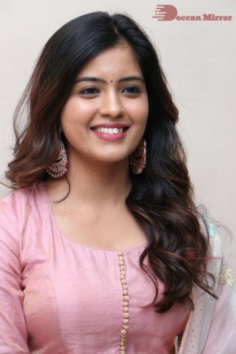 Actress Amritha Aiyer poses for a photoshoot in a pink salwar dress