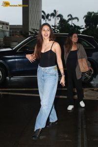bollywood actress Amyra Dastur cute in a black tank top and blue jeans
