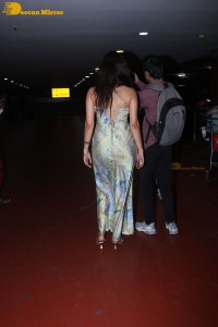 Bollywood Actress Amyra Dastur in a flashy silver dress at the airport