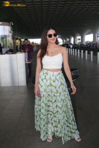 actress amyra dastur in a white top at mumbai airport