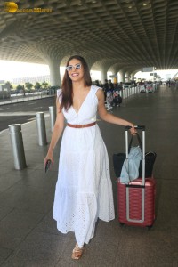 indian actress amyra dastur in a white dress spotted at airport