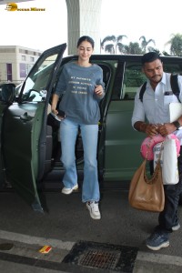actress Ananya Panday chic look in a blue t-shirt and denim jeans