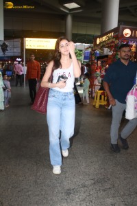actress Ananya Panday spotted at airport wearing a white top and denim jeans