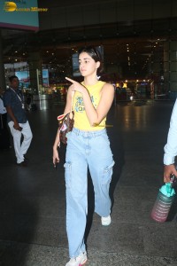 actress Ananya Panday in yellow top and denim jeans