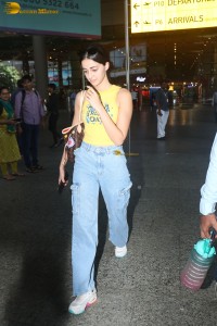 actress Ananya Panday in yellow top and denim jeans