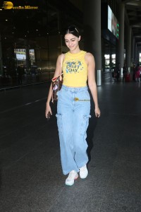 actress Ananya Panday in yellow top and denim jeans