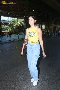 actress Ananya Panday in yellow top and denim jeans