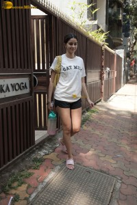 actress Ananya Panday in white t-shirt and black shorts