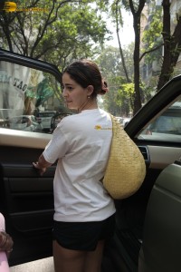 actress Ananya Panday in white t-shirt and black shorts