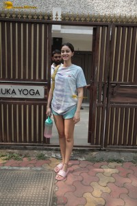 actress Ananya Panday in white t-shirt and green shorts